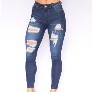 High waisted distressed jeans.